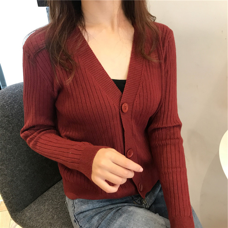 Áo len dệt kim cổ chữ V của Ke Ke áo len tay dài