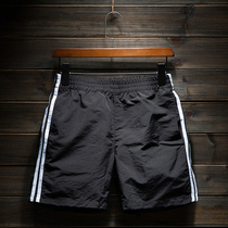 Sports shorts mens quick-drying running three-point pants hot pants beach pants student sports pants three-point shorts mens trendy slim