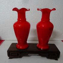 A pair of old vase of the 70s red vase old glass bottle fitting a nostalgic collection of movie props