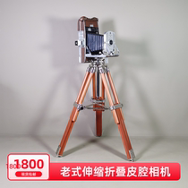 Nostalgic old objects American antique Polaroid leather cavity telescopic folding film camera collection decorative wooden tripod