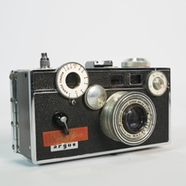 Vintage news reporter taking photos smoke flash camera magnesium wire lamp Argus Argus135 film film camera