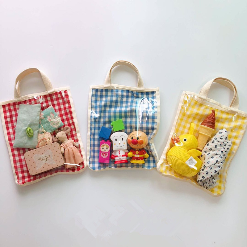 Fart shit, a checkered cashier bag for all you guys ask, a photo-prop recessed styling hand carrying bag mommy bag.