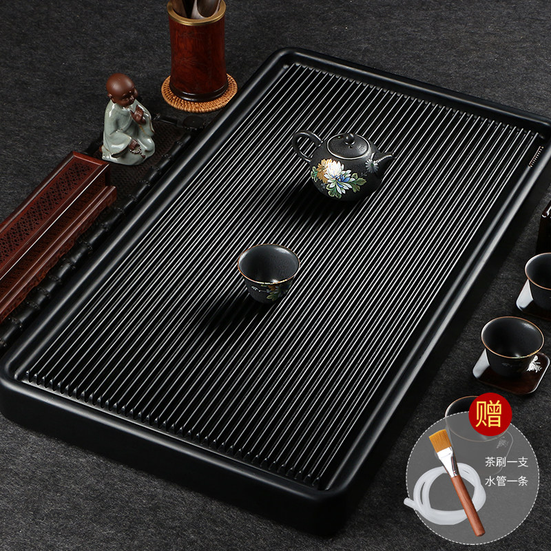 German black stock electric wood tea tray solid wood home pongkutian tea with electric glue wood tea sea drainage small tea table
