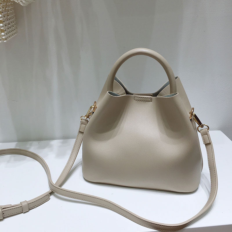 Buy South Korea's simple solidcolor bucket bag fashion a hundred oneshoulder stilettos chiic