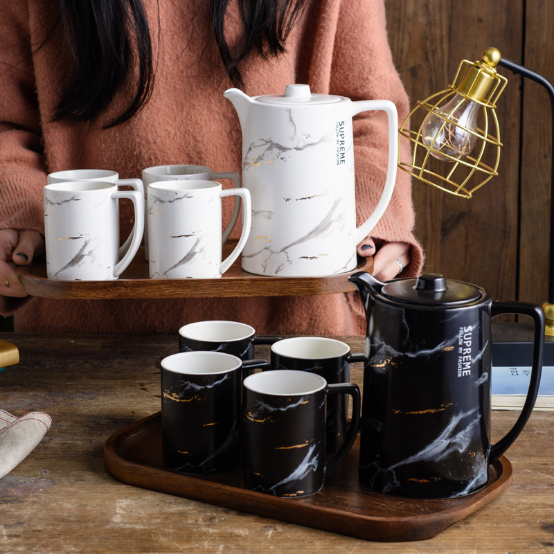The Nordic idea ceramic tea set suits for domestic large capacity flower pot male move woman pure manual small tea cups