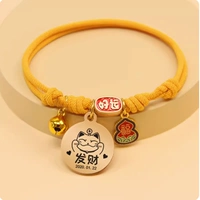 Желтая бренда с удачей веревкой