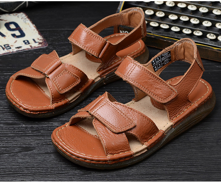 Mùa hè mới dép da nam Velcro giản dị mở ngón chân giày bãi biển handmade ngoài trời thịt bò gân dưới dép da
