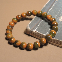 I was stunned by the dialect brand Hetian Jade Huang Qinpi Jasper seed material half mountain half water cornucopia round bead bracelet h0