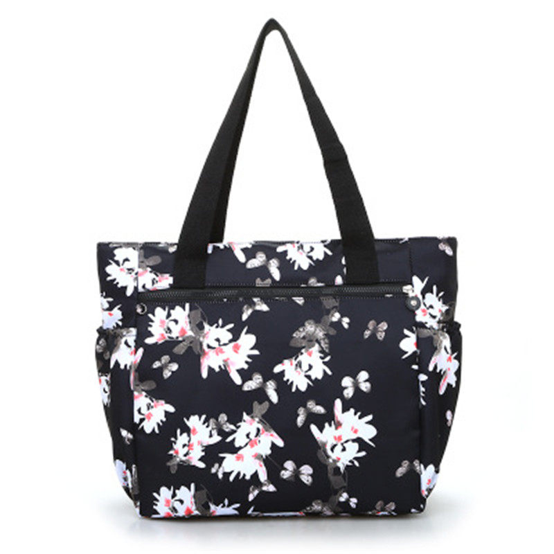 Han edition of single shoulder flower package package and leisure female waterproof nylon tourist shopping bag pack