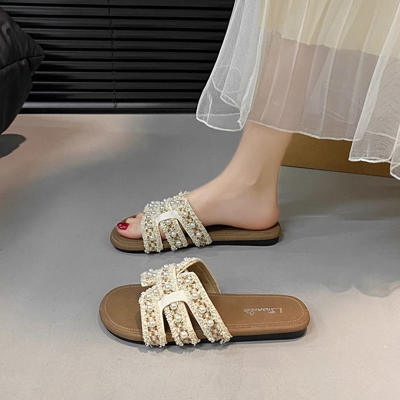 French Fashion Flats-Soled Flip-Flops for Women for Summer Wear 2026 New Fairy Style Versatile Pearl Beach Sandals French Fashion Flats-Soled Flip-Flops for Women for Summer Wear 2026 New Fairy Style Versatile Pearl Beach Sandals