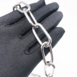 Краткое кольцо с собакой с собакой с головокружительностью из нержавеющей стали.