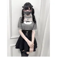 Black and white plaid tops booked