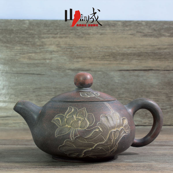 Guangxi Qinzhou pottery pot hand-pulled home portable pot carving craft relief tea set kung fu teapot