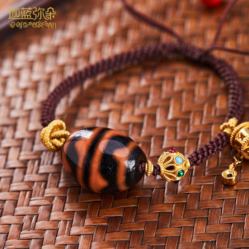 (Jia Tianzhu) Tibetan orange meat tiger tooth dzi bead hand chisel women's Tibetan style diamond knot national wind woven bracelet