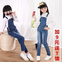 Quần trẻ em mùa xuân và mùa thu cô gái mới denim yếm quần trẻ em trẻ em phiên bản Hàn Quốc của quần dây đeo liền kề yếm jean cho bé gái