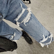 Spring new high-waisted stretch belt diamond denim trousers women are fashion big holes light blue small feet pants boots pants tide