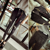 South Korea 18 autumn new fashion false hole jeans women show thin high waist stretch black small pants tide 24 yards