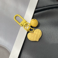 Желтый брелок