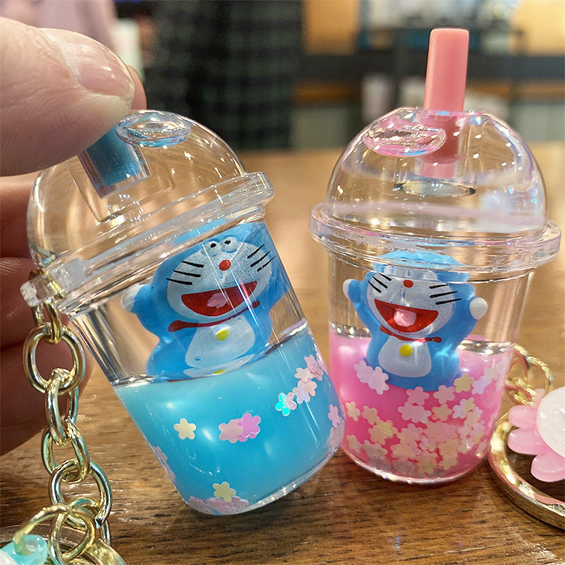 Cute card with oil flow sand bites When cat liquid floating acrylic bag pendant chain bag hanging decoration key buckle