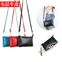 First layer cowhide womens bag 2021 new European and American fashion leather clutch large capacity change shoulder messenger bag