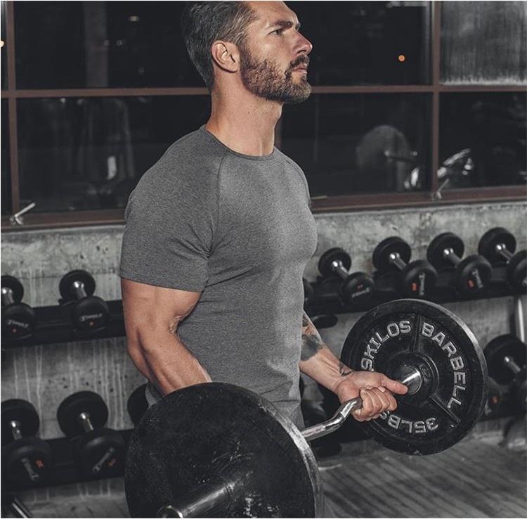 Thể thao Áo thun ngắn tay mùa hè Mới cơ bắp Anh em Cơ bắp thuần túy Slim Fitness Vòng cổ - Áo phông thể thao áo thun dài tay the thao nam