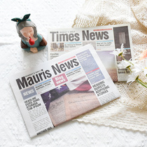 Retro-style English newspaper Does old foreign newspaper shoot props ornaments cosmetics decoration background photo props