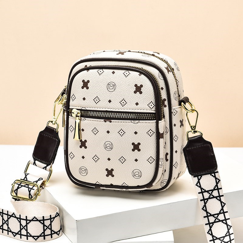 2022 new wave-free mobile phone small bag of women light broadband slanted bag 100 hitch small crowd zero money mobile phone bag