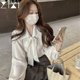 Bowknot shirt women's design sense niche top 2023 new French style high-end long-sleeved professional white shirt