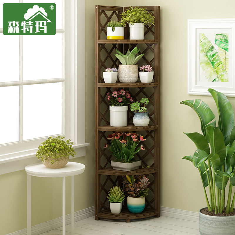 Multi-layer solid wooden objects in the corner of the flower shelf. The indoor balcony holds a floor-type potted pot frame with meat
