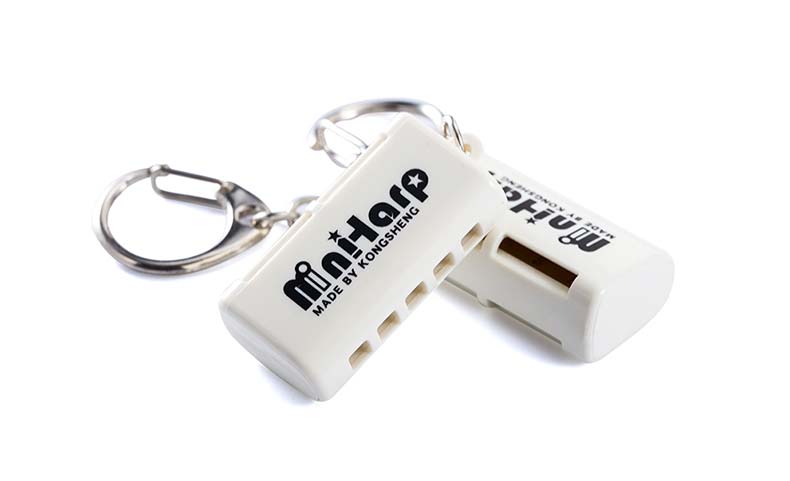 Lỗ âm thanh 5 lỗ 10 giai điệu móc khóa mini hòa âm Món quà sáng tạo trẻ em mới bắt đầu năm lỗ mười giai điệu công cụ quà tặng - Nhạc cụ phương Tây đàn morris
