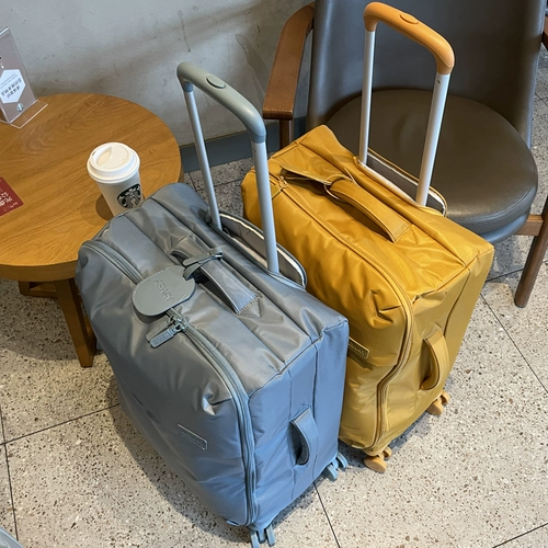 Японский сверхлегкий нетканый универсальный водонепроницаемый чемодан