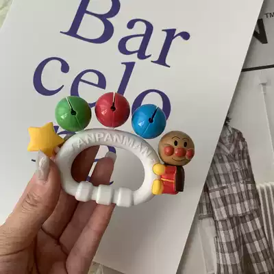 Export Japanese bread germ Superman rattle play hand bell drum musical instrument to soothe sleeping toy playmate