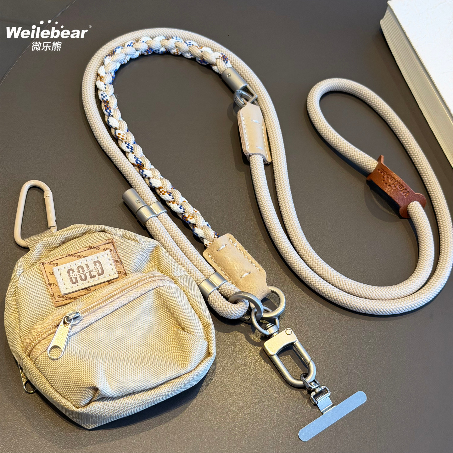 イヤホン収納バッグ、小銭入れ、スマホストラップ、調節可能なクロスボディストラップ、ネックストラップ、レザー製つま先、編み込み式アウトドア用紛失防止チェーン付き。