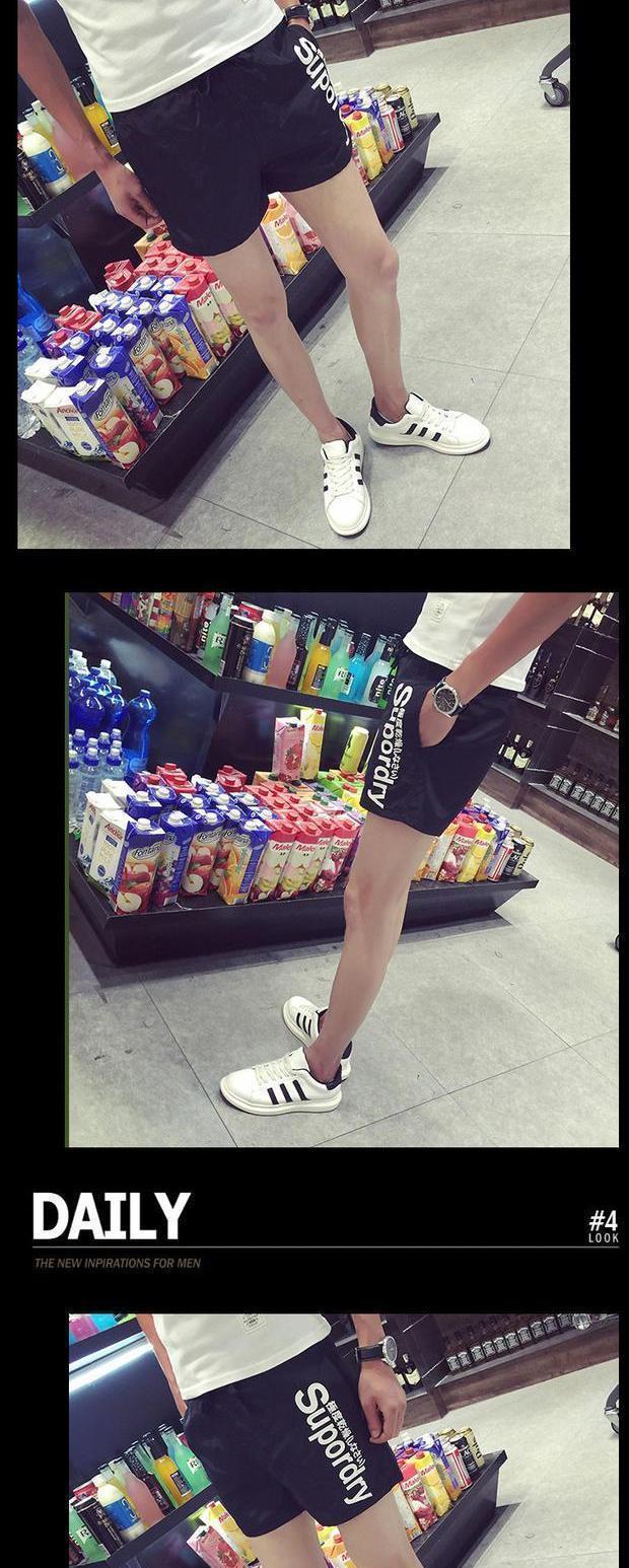 Đàn ông mới 9,9 nhân dân tệ chín chín người đàn ông thon gọn thể thao năm điểm quần short 9 10-20 nhân dân tệ quần short nam