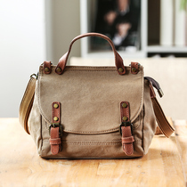 Xiao Shuang has a Michael Bag girl 2021 new skewed bag English Retro Shoulder Post Bag small handbag