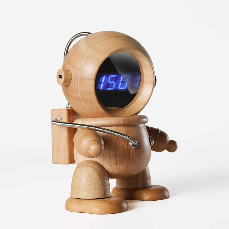 Several people design astronaut solid wood electronic alarm clock desktop swing piece student boy gift idea clock can be lettering 