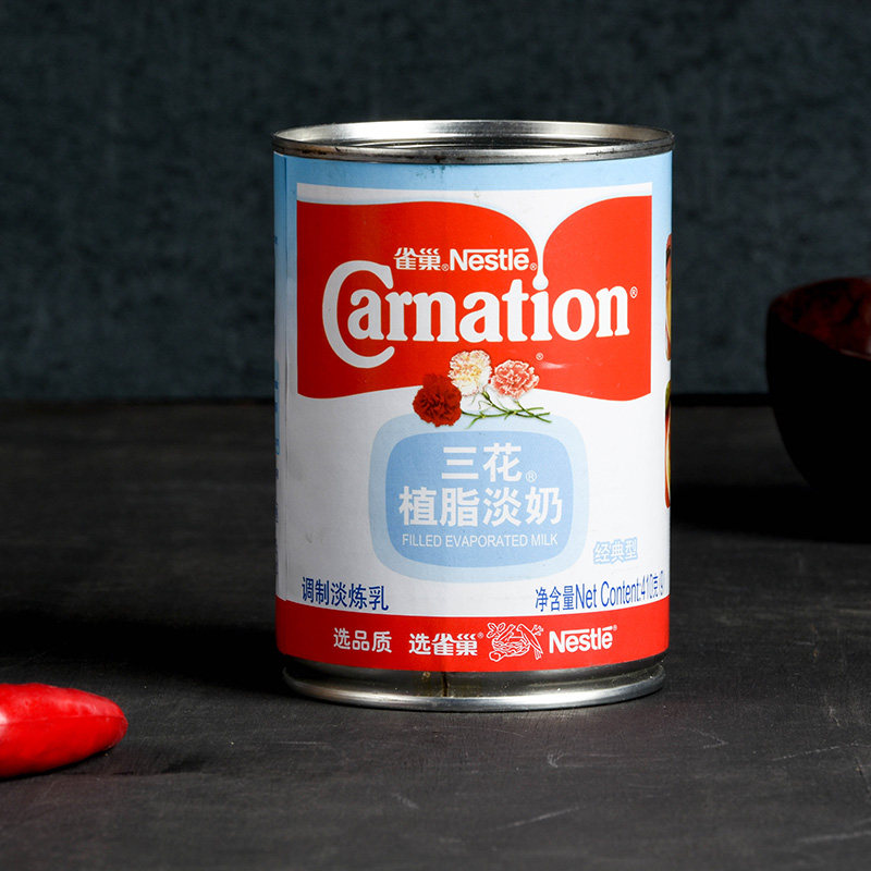 Nestle three-flower non-fat evaporated milk 410g three-flower evaporated milk three-flower non-fat evaporated milk tea coffee companion evaporated milk