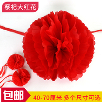 When visiting the grave use big red flowers red cloth flowers red flower balls hanging flowers on the tombstone small lion flowers and tie big red flowers with your hands when sweeping the grave.