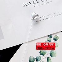 Серебряный воздушный шар в форме сердца