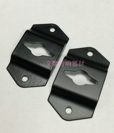 A small hook with iron hook after a ring - up of a small slice of a wall - slice after a speaker