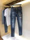 Mùa xuân nam mới quần jeans người ngoài hành tinh rách chân quần thời trang quần lọt khe thương hiệu quần nam - Quần jean