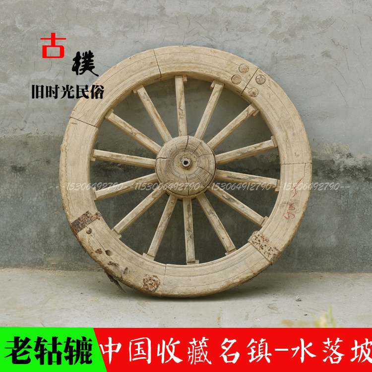 Nostalgic old objects folk miscellaneous old cars, reels, wagon wheels, old-fashioned old wood wheels, retro decorative ornaments