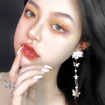 Original Super Fairy Tea Flower Butterfly tassel long earrings temperament personality cold wind suitable for round face earrings earrings