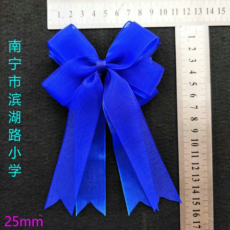 Nanning Binhu Road Primary School school style school uniform wearing headdress hair accessories royal blue bow hairpin head flower