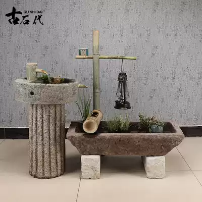 Old stone tank fish tank bamboo flowing water combination landscape old stone landscape stone cylinder outdoor water scene Garden sink nostalgia