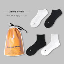 4 pairs of autumn and winter mens breathable Terry socks sweat-absorbing short middle tube mesh sports thickened cotton black and white solid color
