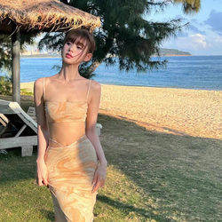 ການອອກແບບ niche Coconut Grove Sand Shadow Stretch Mesh Pure Desire Strap Top Slit Long Skirt Super Fairy Seaside Vacation Skirt