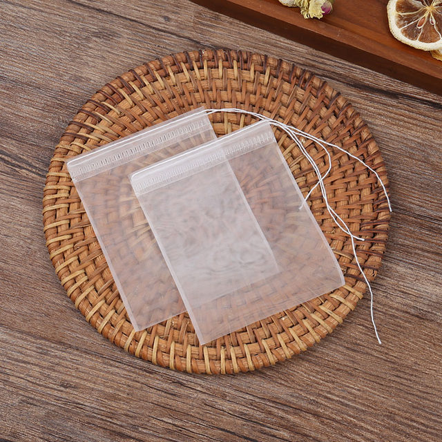 Disposable self-sealing threaded nylon tea bag filter bag tea scented tea bag cooking filter bag empty ຊາຖົງ