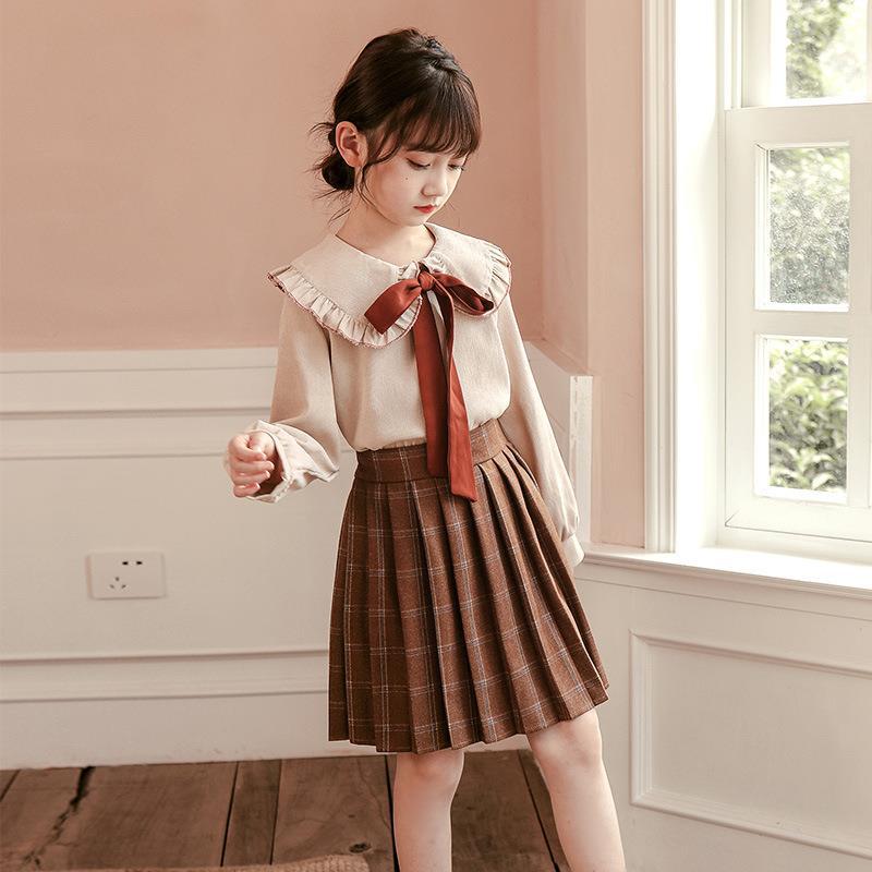 Girls jk style suit 2021 early autumn fashion Western style doll collar woolen plaid skirt retro long sleeve two-piece set