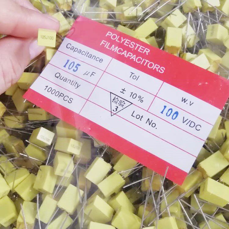 Yellow Corrected Film Capacitive 105J 100V Corrected capacitive 105UF 100V foot distance 5MM Original dress